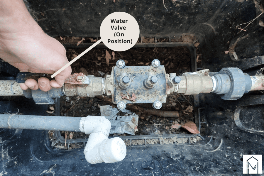 Opening the sprinkler valve to the full position after cycling through each sprinkler zone