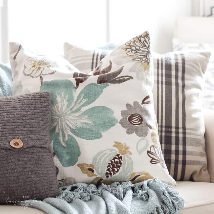 using pillow covers over your existing pillows do create a mix and match look is a great budget solution