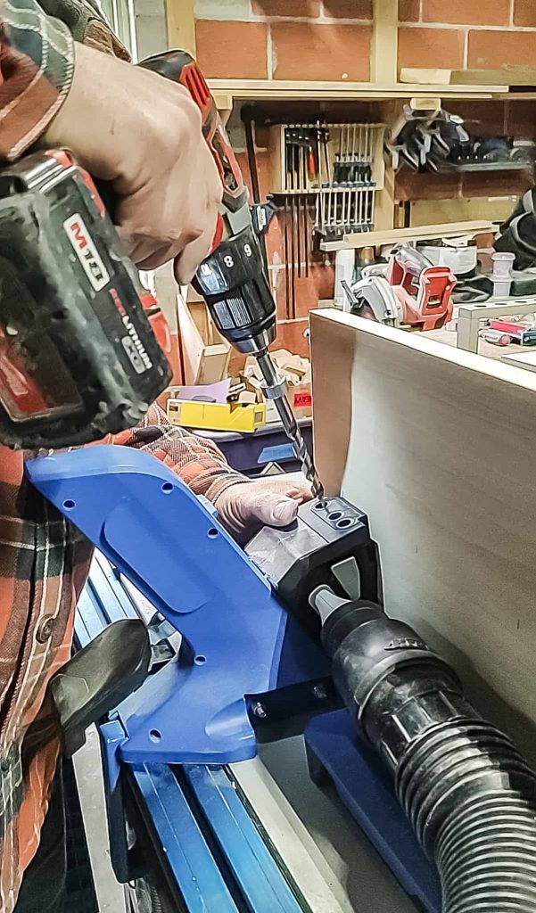 using the kreg 720 pro pocket hole jig to make pocket holes in a piece of popular wood for a project