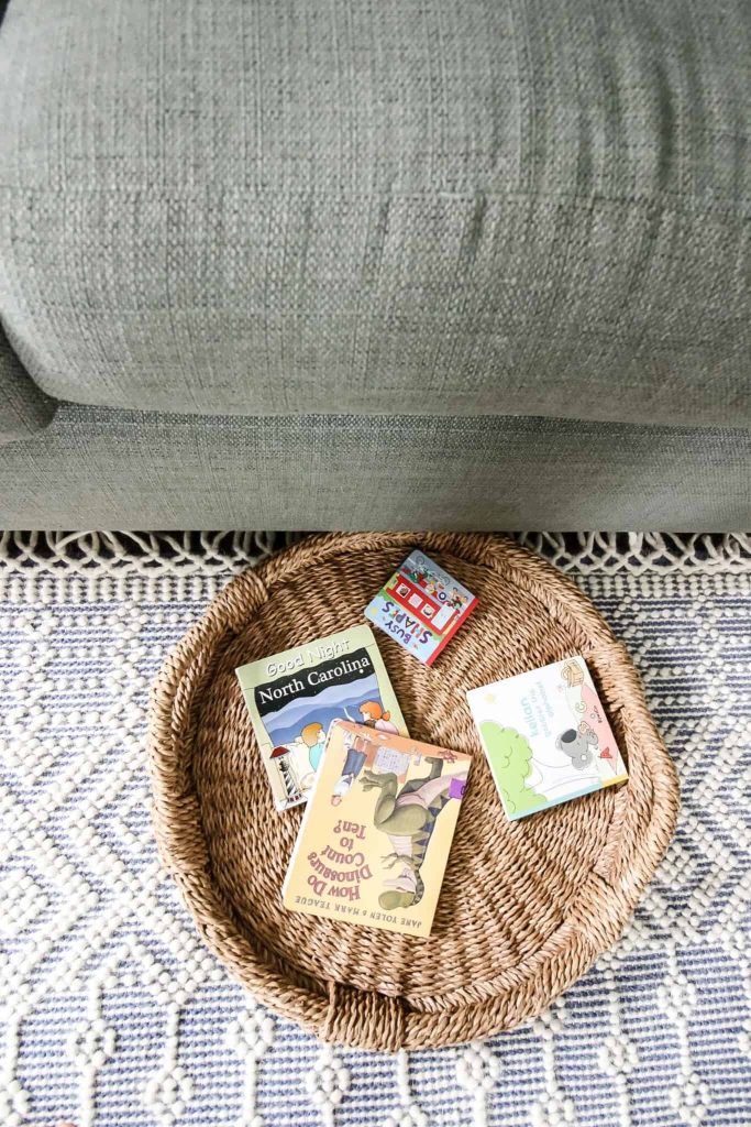 wicker tray to slide under the sofa for book storage