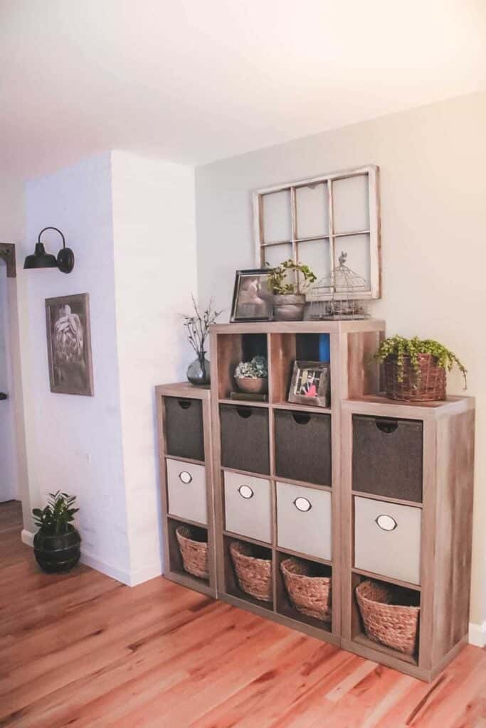 cube storage unit with baskets and bins for toy storage in living room