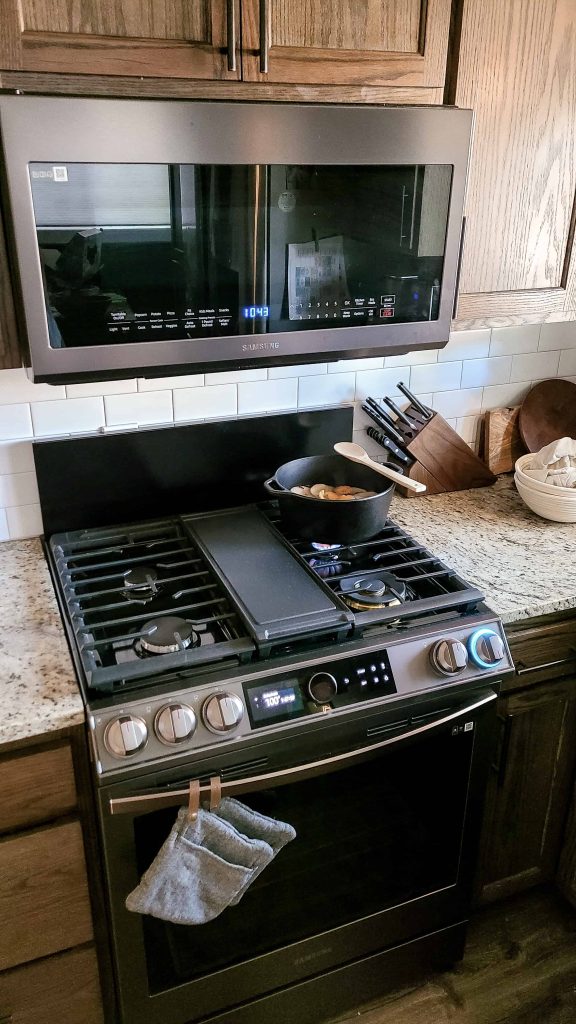 A photo of a Samsung Bespoke Gas Range used for cooking.