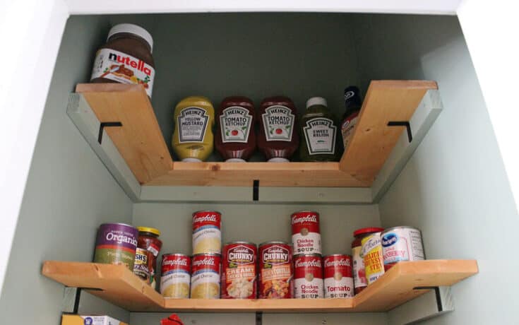 https://www.makingmanzanita.com/wp-content/uploads/2023/06/u-shaped-shelves-at-the-top-of-pantry-for-canned-food-735x460.jpeg