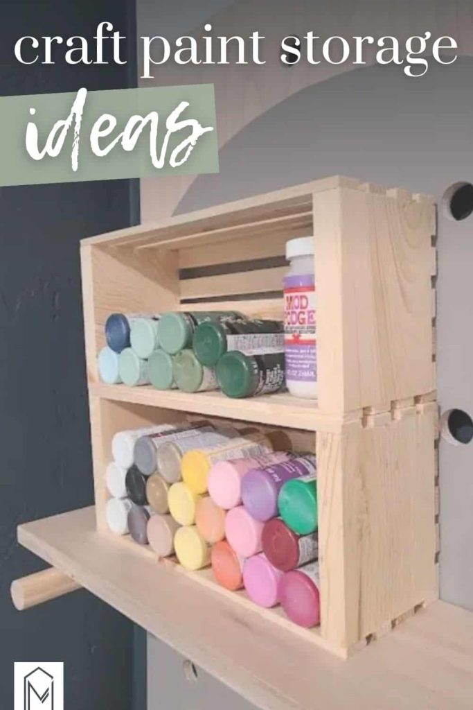 craft paint storage shelf with built-in color swatch display in wooden crates with text overlay that says craft paint storage ideas