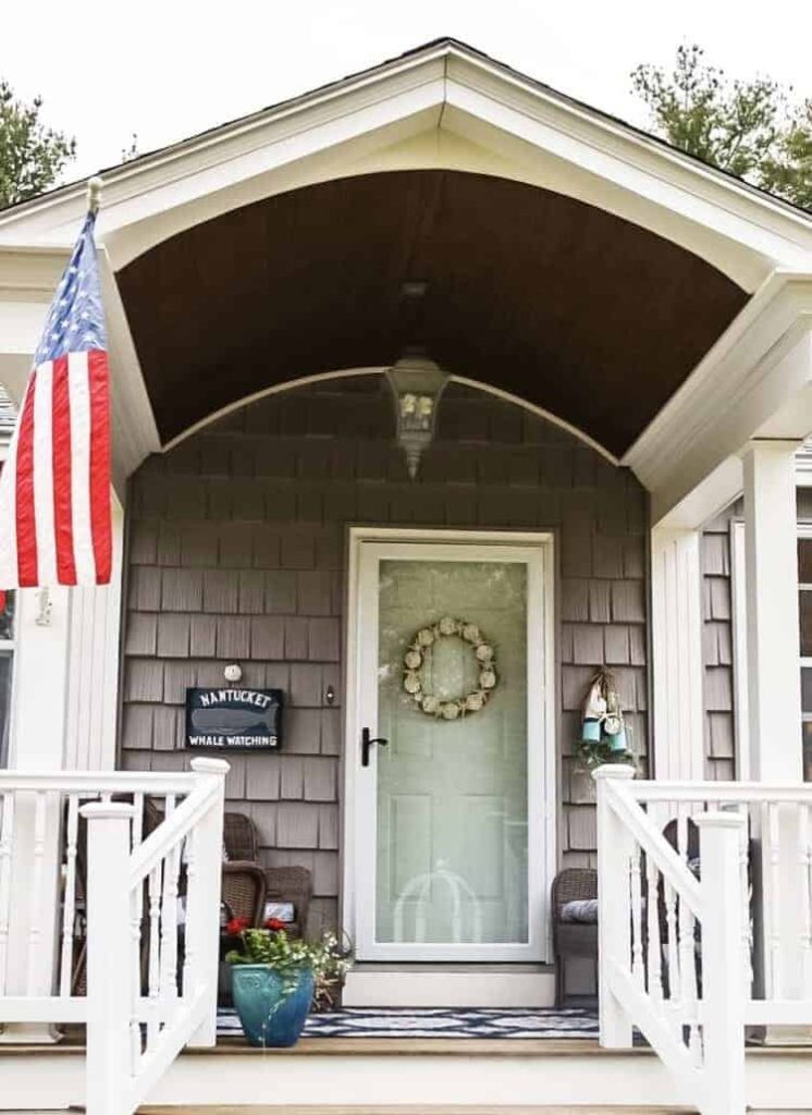 front porch portico with wood underneath top