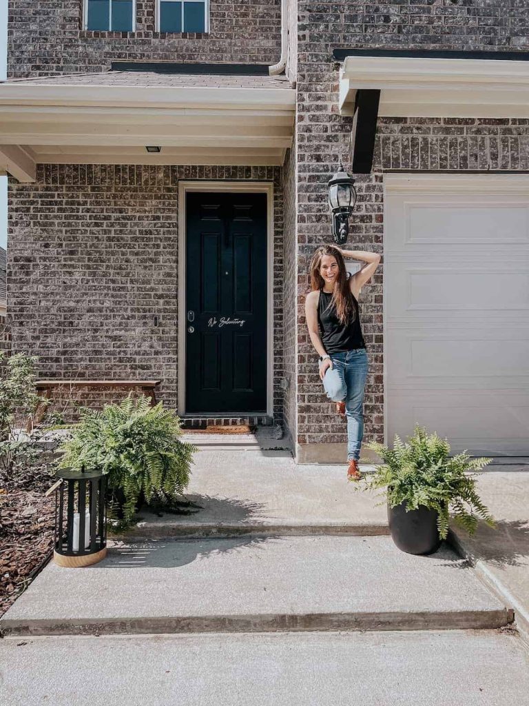 simple flat front door portico on brick house