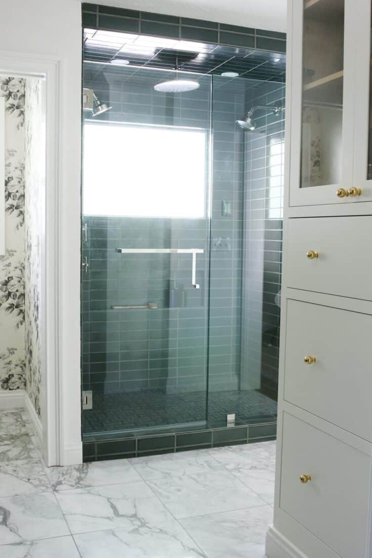 https://www.makingmanzanita.com/wp-content/uploads/2023/07/shower-with-green-tile-and-wide-shower-shelf-735x1103.jpg