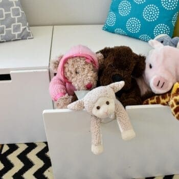 Stuffed animals spilling out of an Ikea STUVA drawer