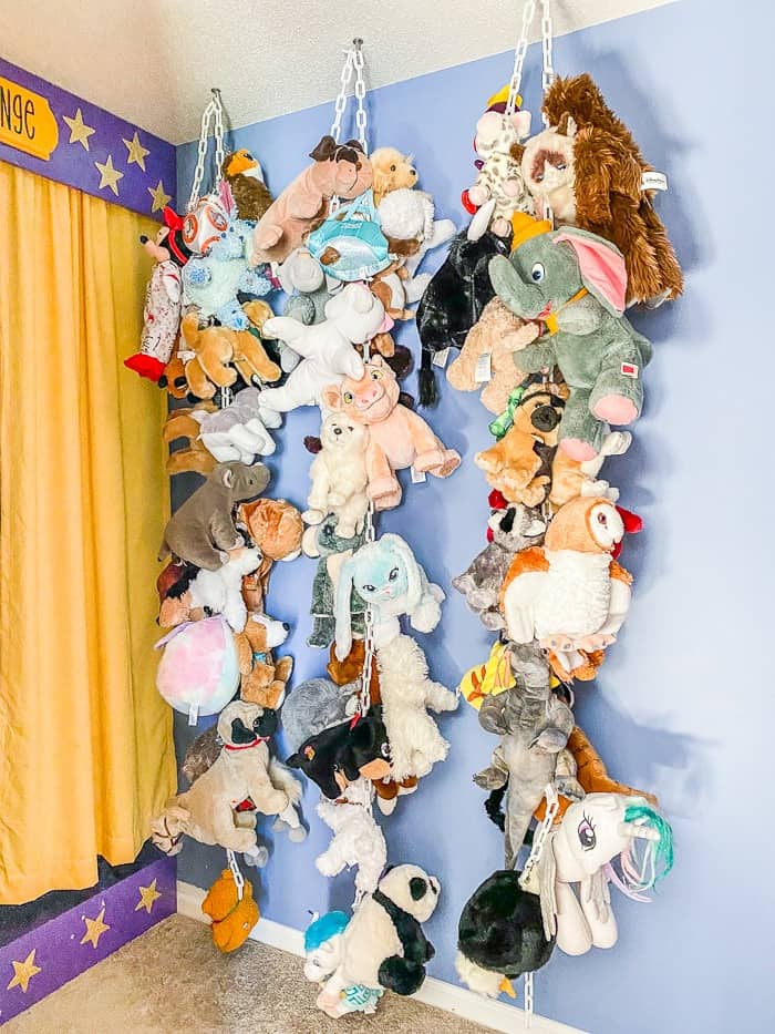 Stuffed animal storage using chains hanging from the ceiling