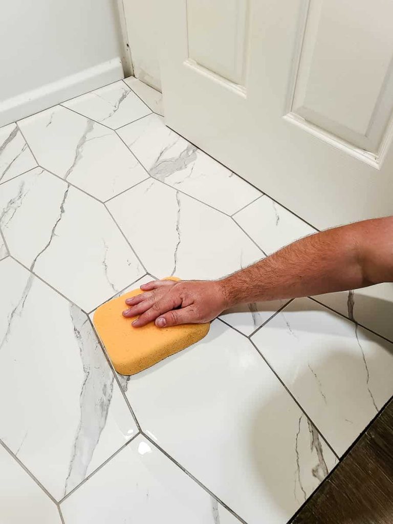 Another picture shows a person cleaning the surface of tiles with a sponge.