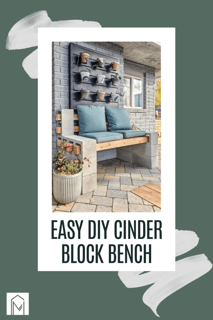 A concrete block bench with a potted plant, cushion, and pillow transformed into an outdoor seating area. With text overlays saying "Easy DIY cinder block bench".