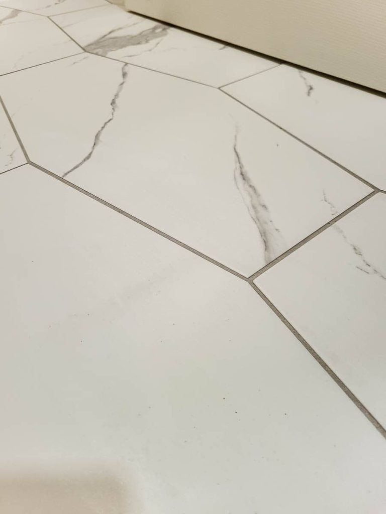 A photo of the floor tiles before they were cleaned