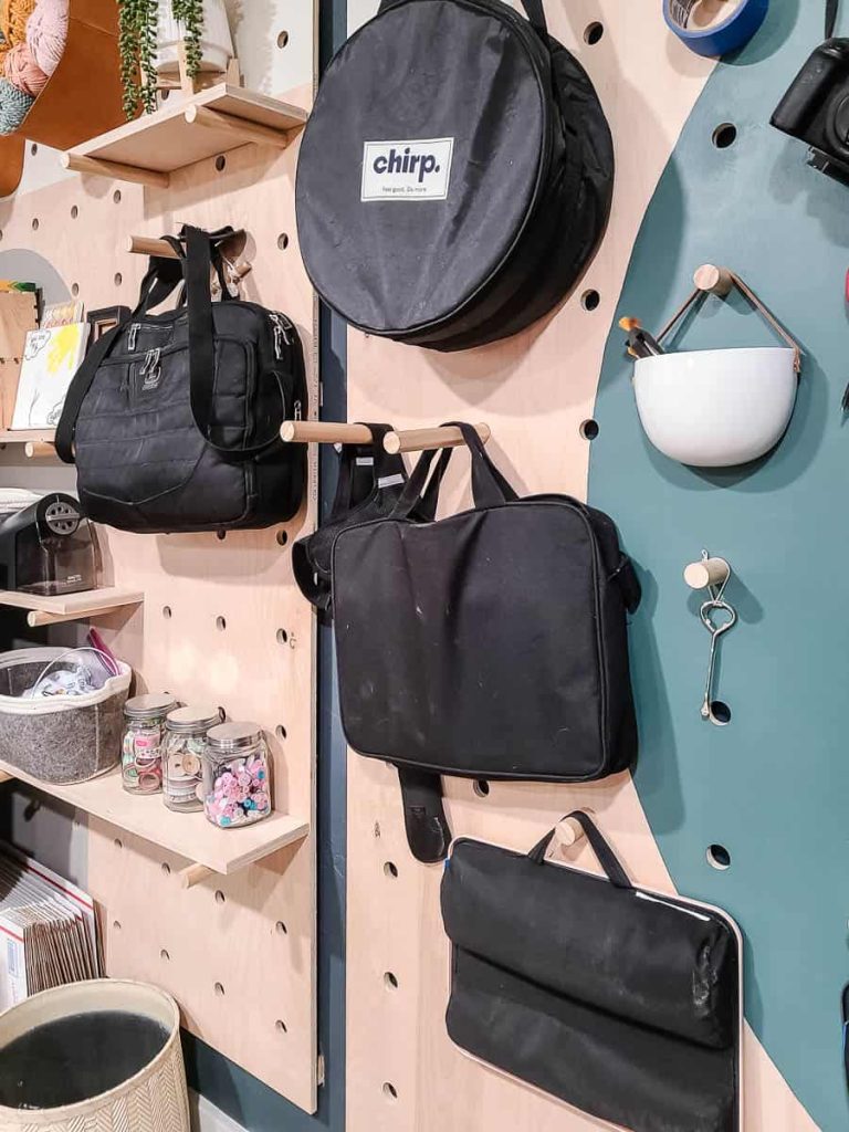 Closer look of the pegboard and featuring the small lap desks.