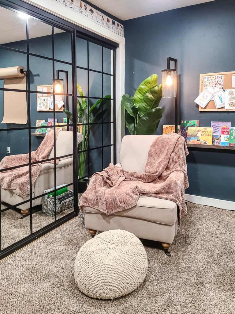 Inviting living room space with a backdrop of educational books.