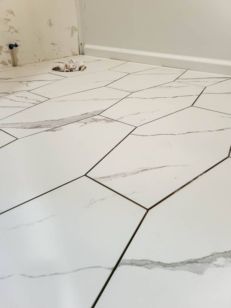 Image of ungrouted tiles laid in a  pattern.