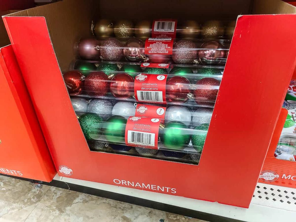 A collection of Christmas ornaments in various colors.