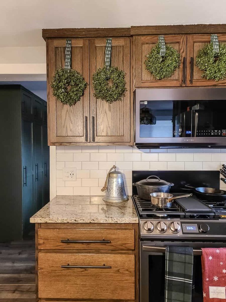 Mini Wreaths On Kitchen Cabinets for Easy Christmas Decor