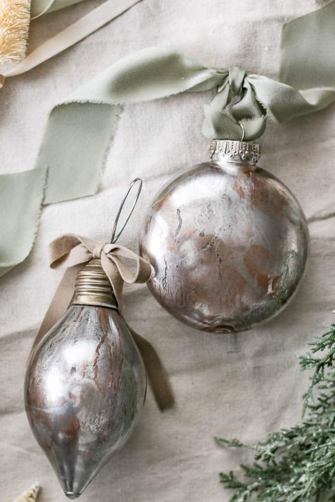 A picture of finished DIY mercury glass Christmas ornaments.