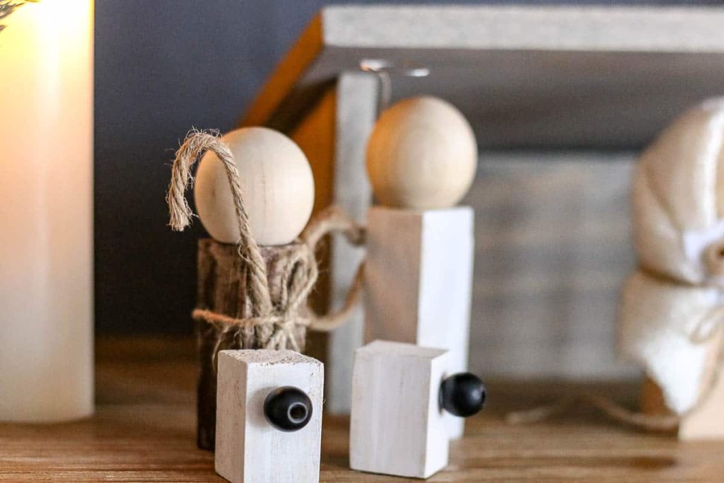 Two wooden dolls, a DIY nativity scene.