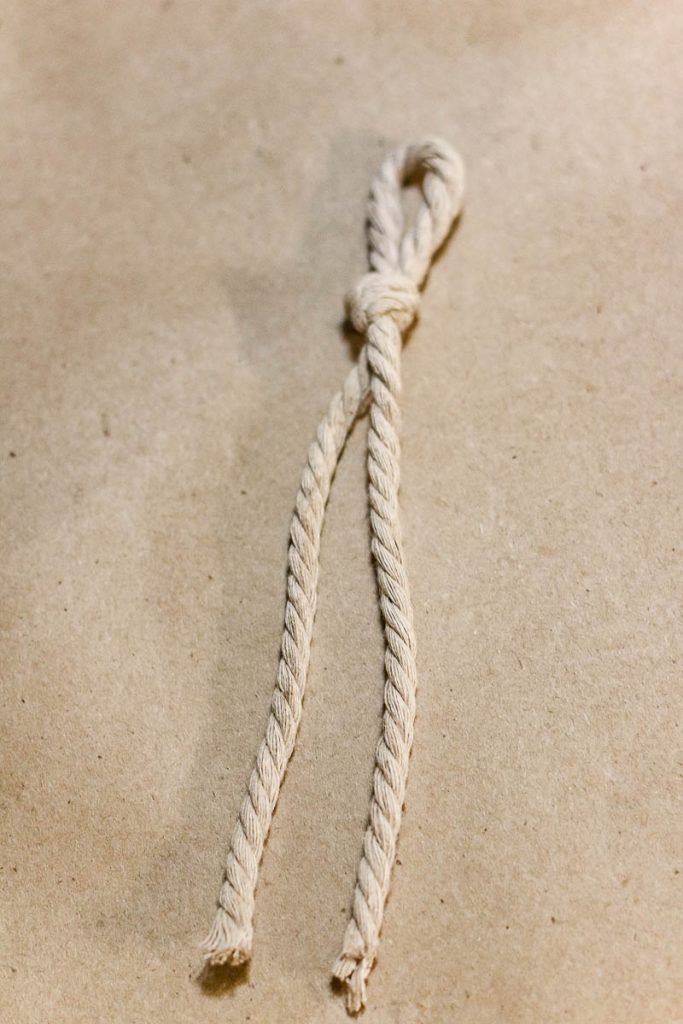 A picture of a cord tied at the top