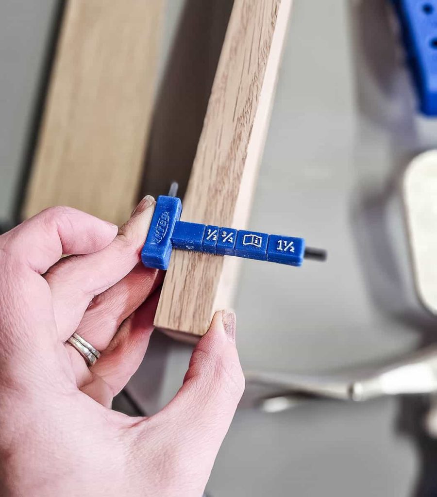 Close-up image showing wood thickness being measured.