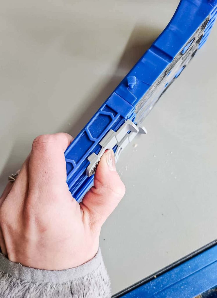 Image of a person positioning stops on the jig.