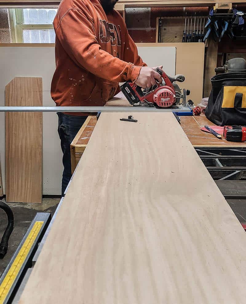 Cutting a sheet of plywood with a circular saw and track guide from kreg