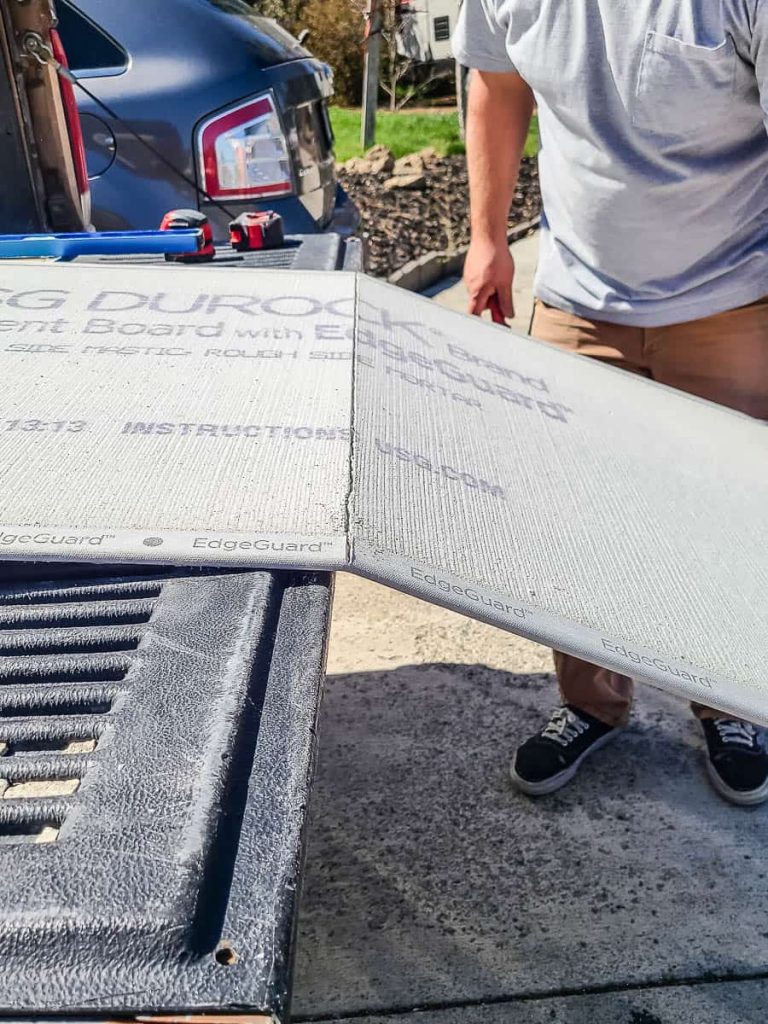 The snap method involves scoring a straight line on a cement board with a utility knife and then snapping it along the scored line to cut it cleanly.