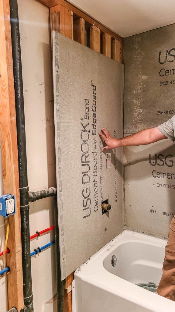 Cement board installed on the wall of a bathroom.