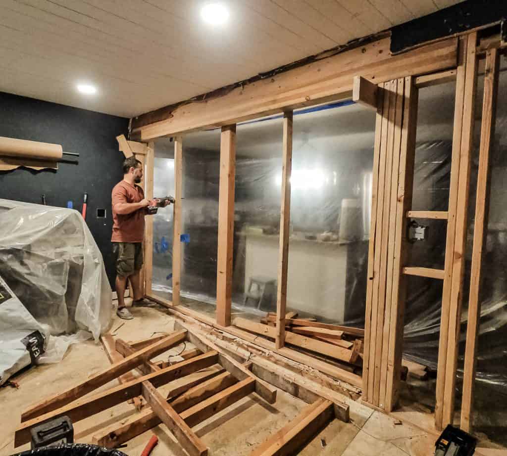 Cutting temporary wall supports with Sawzall at an angle