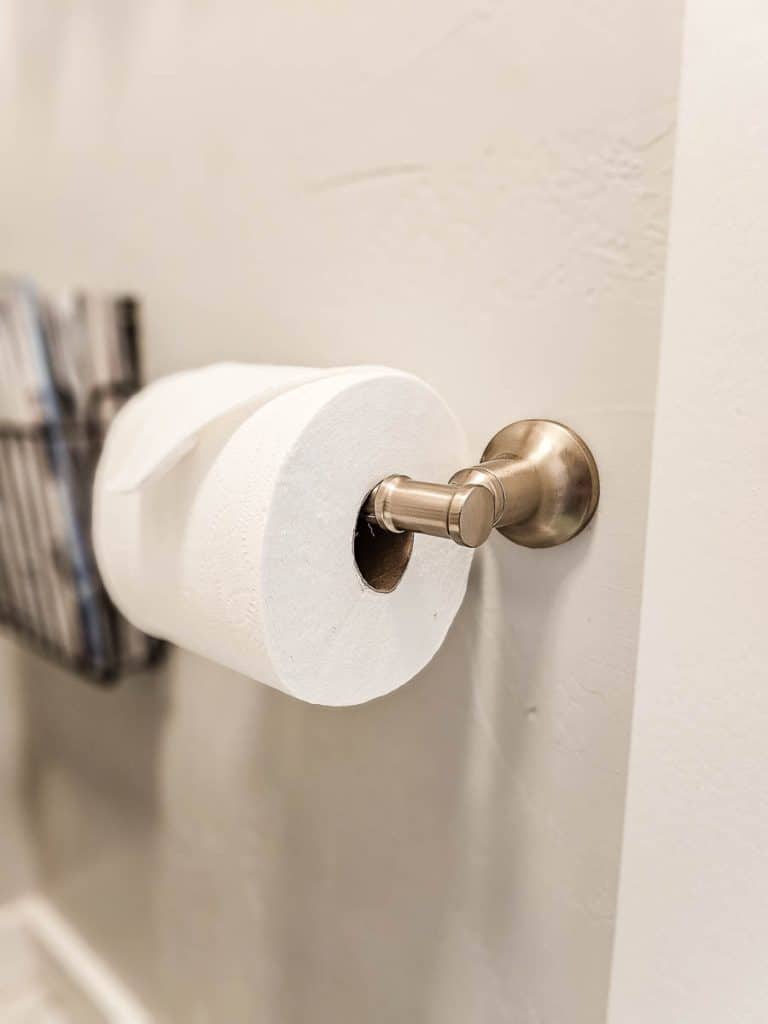I love the little touch of luxury that this new toilet paper holder in Champagne Bronze brings the bathroom