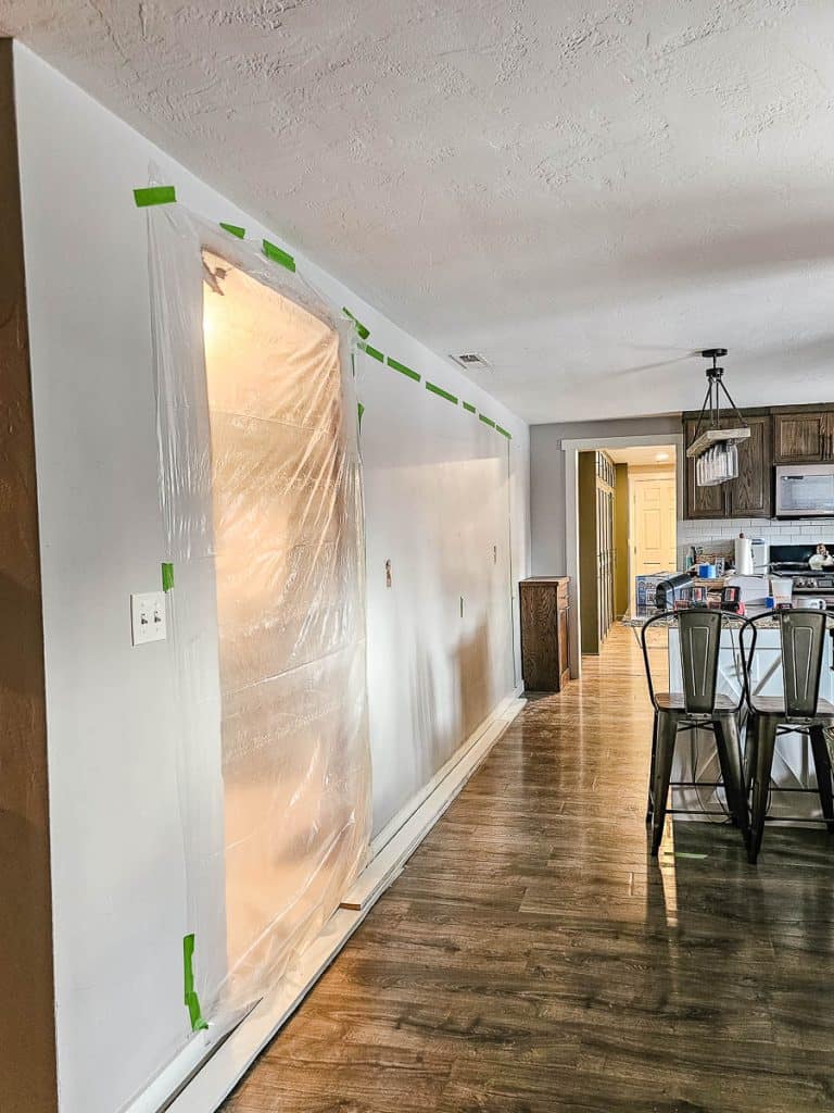 Contemplating opening up the walls in our kitchen to create an open concept with dining room and living room