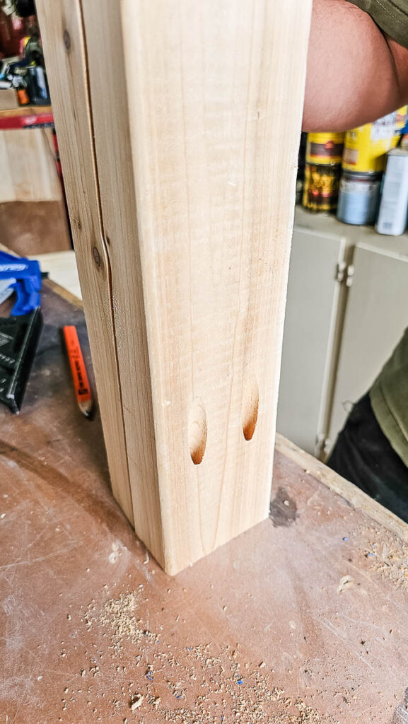 A photo of a piece of 4x4 wood featuring a pocket hole for screwing.