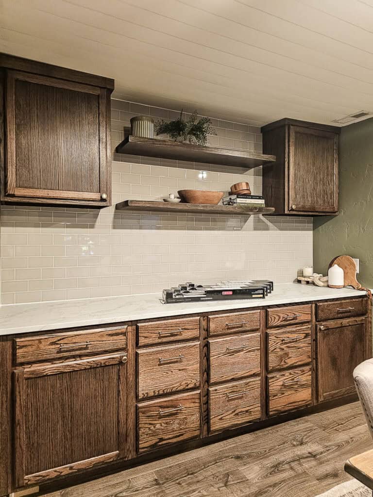 A photo of stock cabinets used to create DIY built-in cabinets for a dining room.
