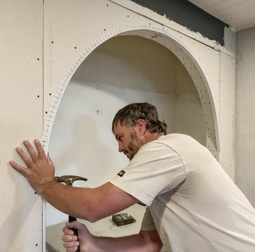 Nailing on flexible corner bead around arched doorway 