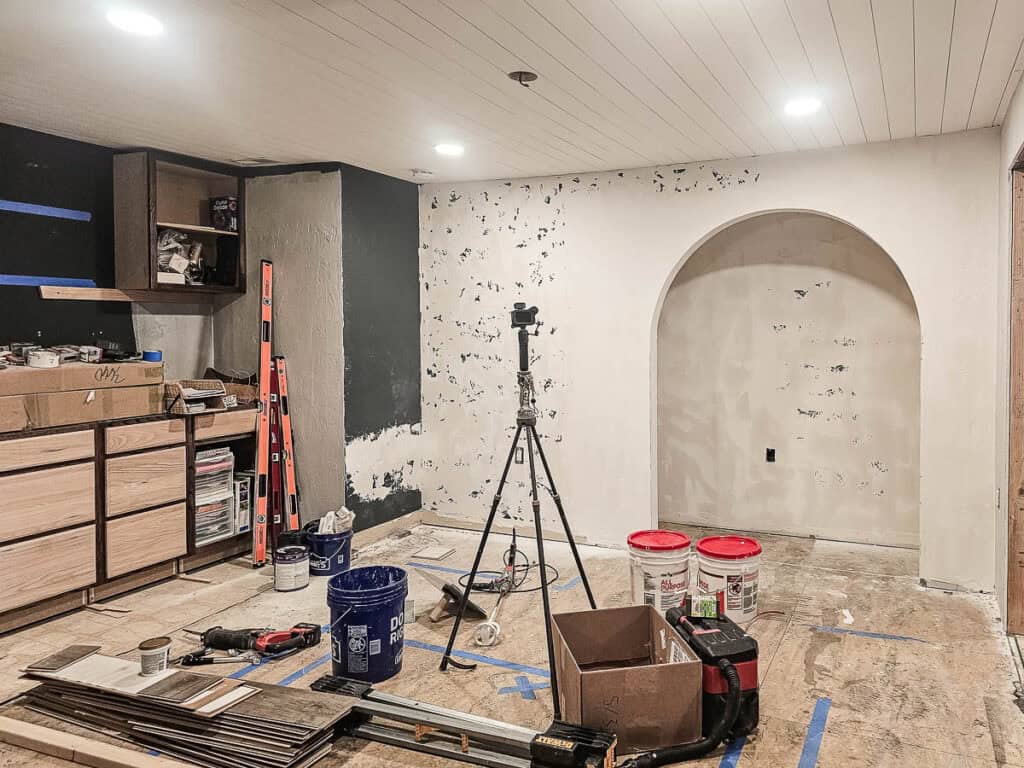 Archway and wall with fresh drywall mud and texture