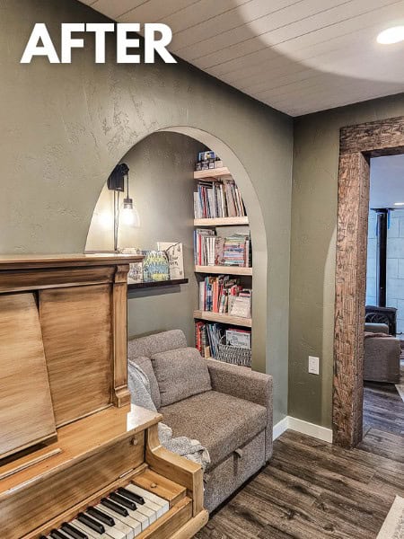 Dining room with closet turned into a reading space with bookshelves and small couch