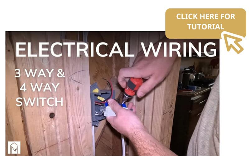 A photo of a man redoing the electrical wiring.
