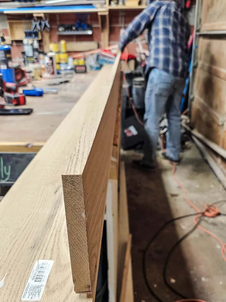 Connecting oak wood pieces together with dowel joinery for fake wood beams