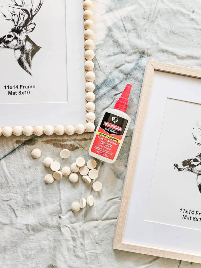 A photo of a bobbin picture frame with glue .