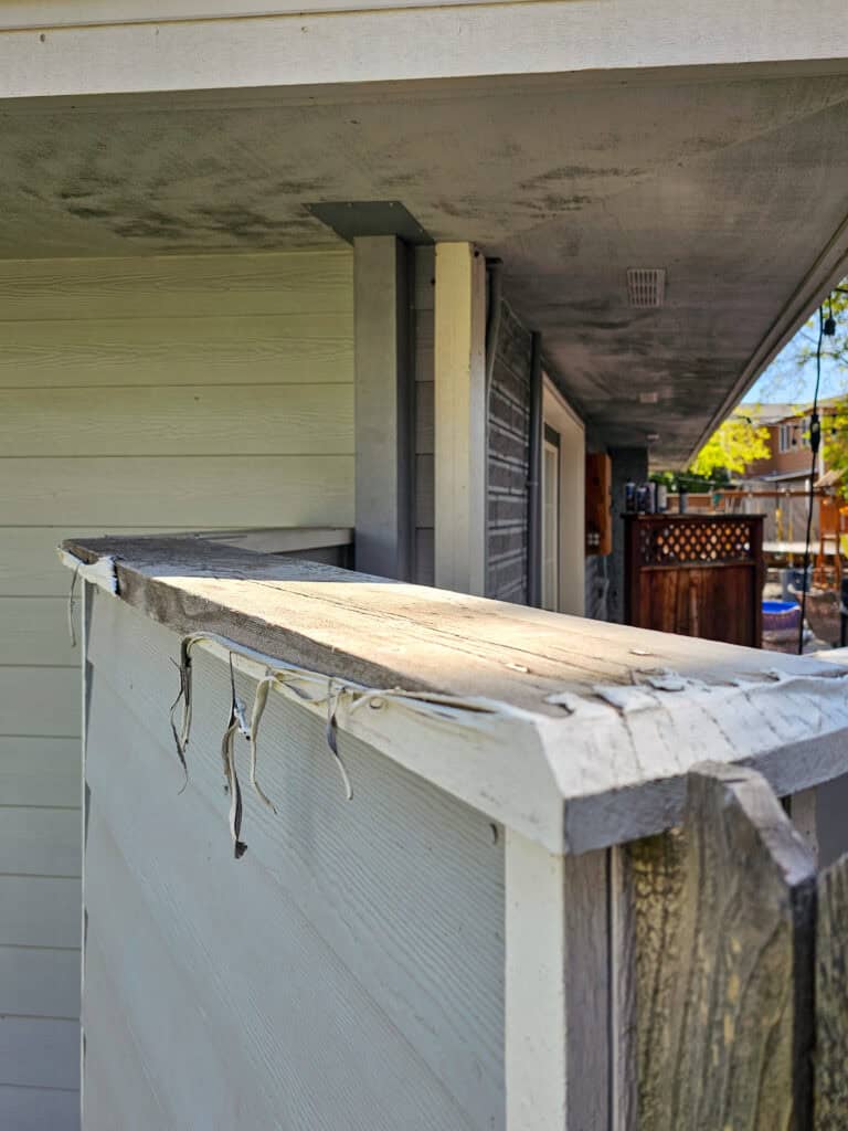 A photo of a rotted wood outside the house